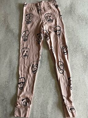 nununu Pink Leggings with Black Skull Print